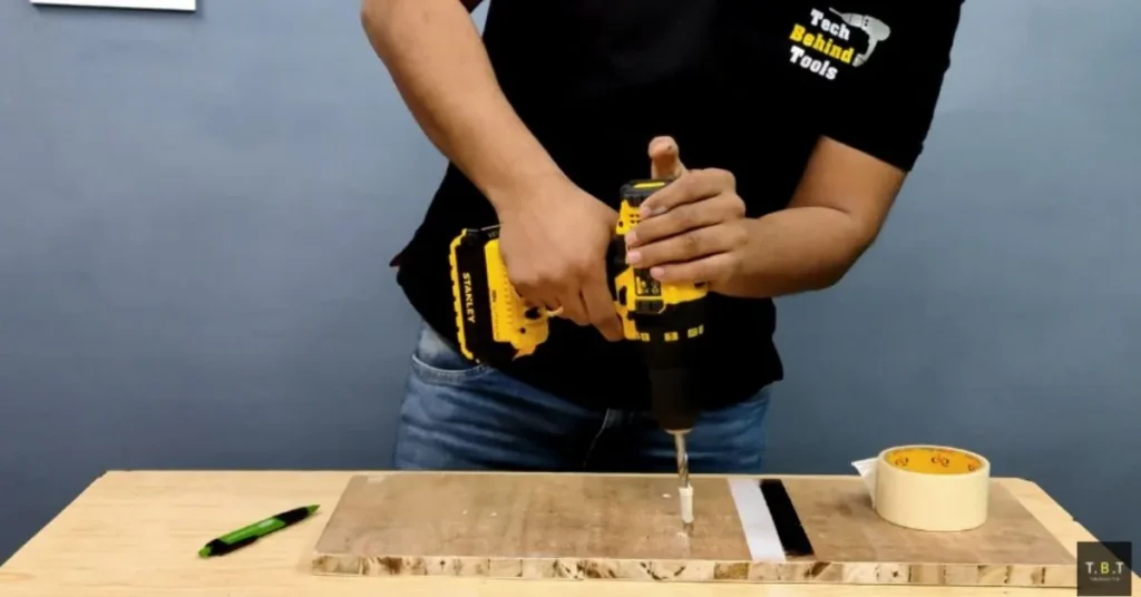 Masking tape used as a drill bit depth stop