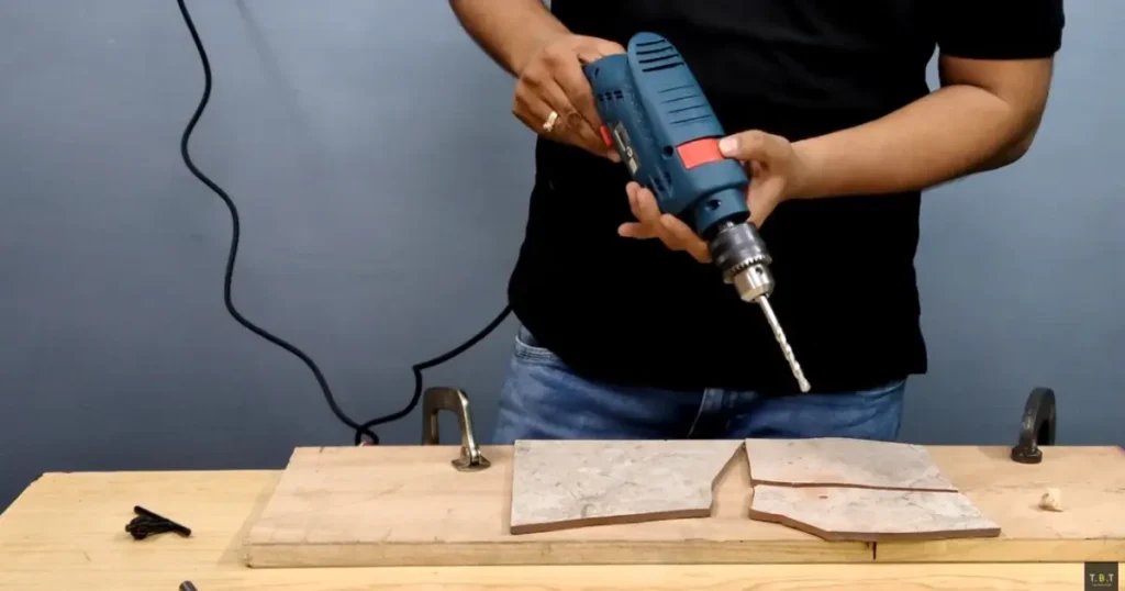 Always use drill or screw driver mode while drilling ceramic tile
